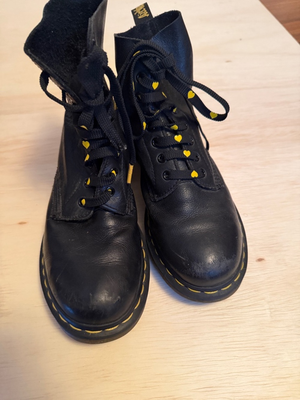 Dr. Martens Black Combat Boots with Yellow heart shoestring detail